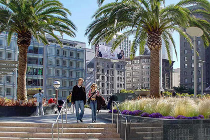 Photo of couple walking down stair well at Union Square in San Francisco